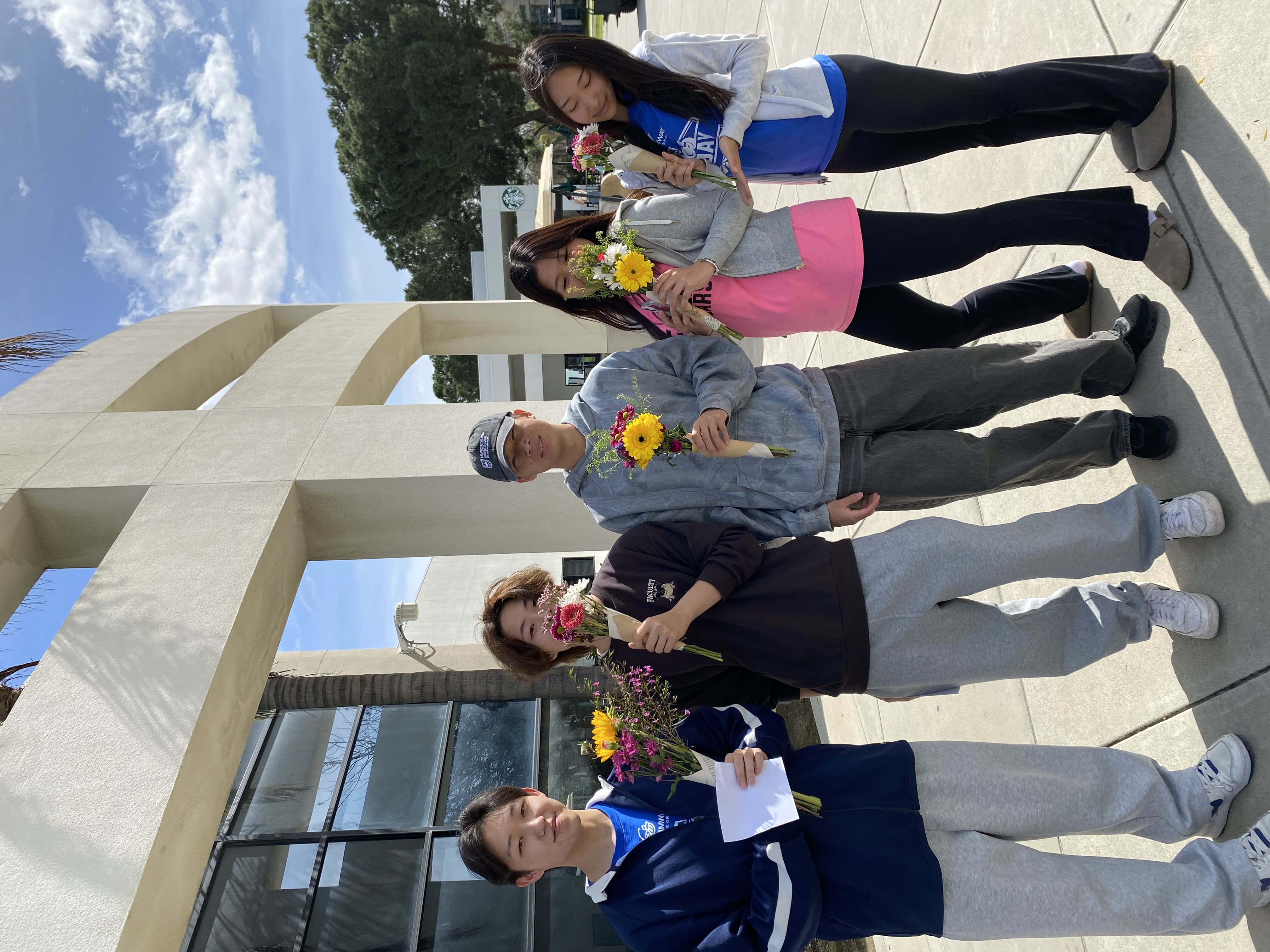Group Holding Their Flowers